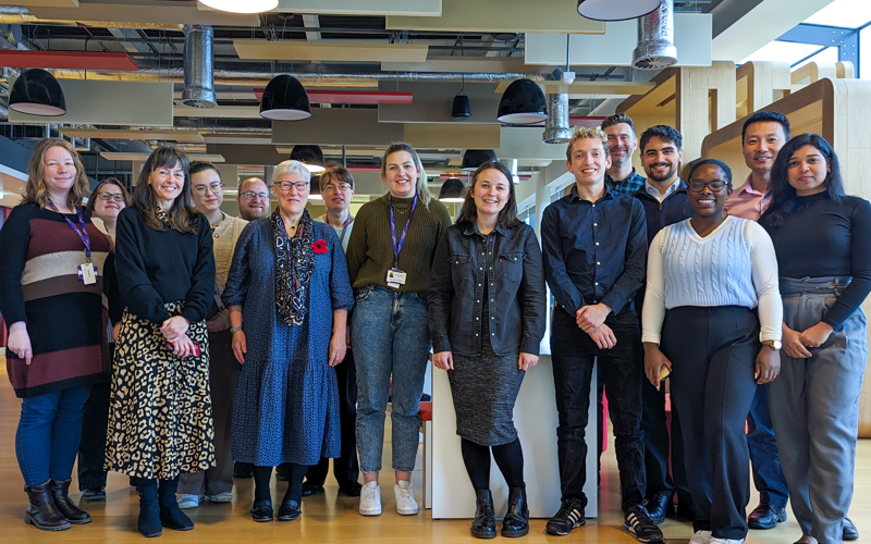 Photo of the Appian and RDS teams, standing and smiling at the camera