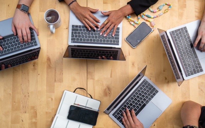 Five laptops viewed from above